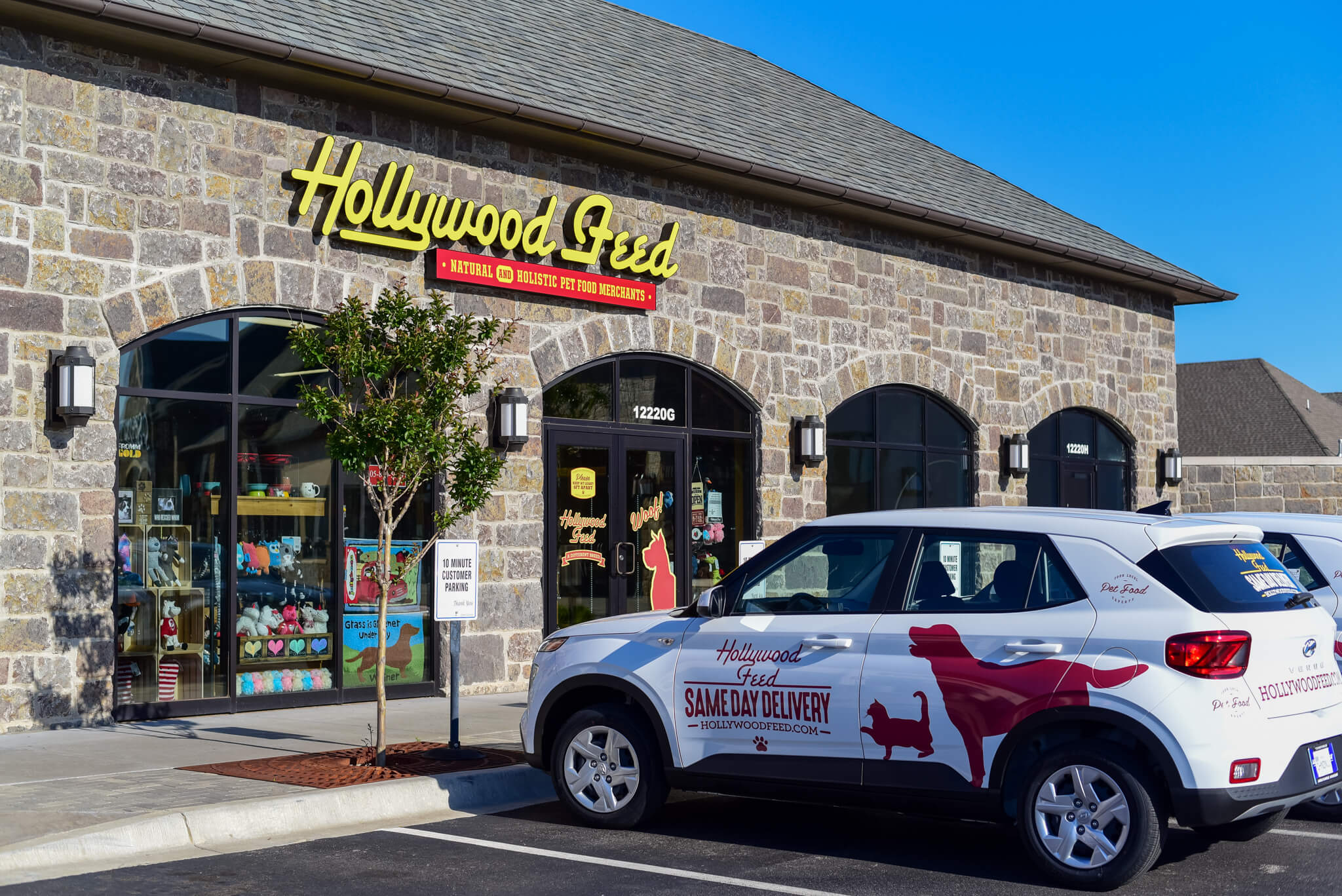 Hollywood Feed Staff getting ready to enter the Same Day Delivery Car
