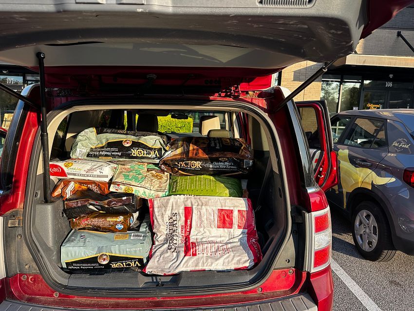 Same Day Delivery car with foods to be delivered to Rescure Partners